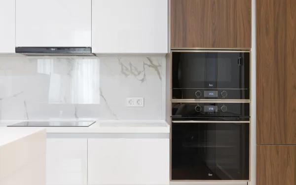 Microwave Repair in Springfield MO | Service Brothers Built-in microwave above a wall oven in wood cabinetry