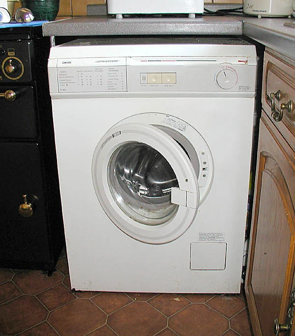Front-load washing machine with its door open