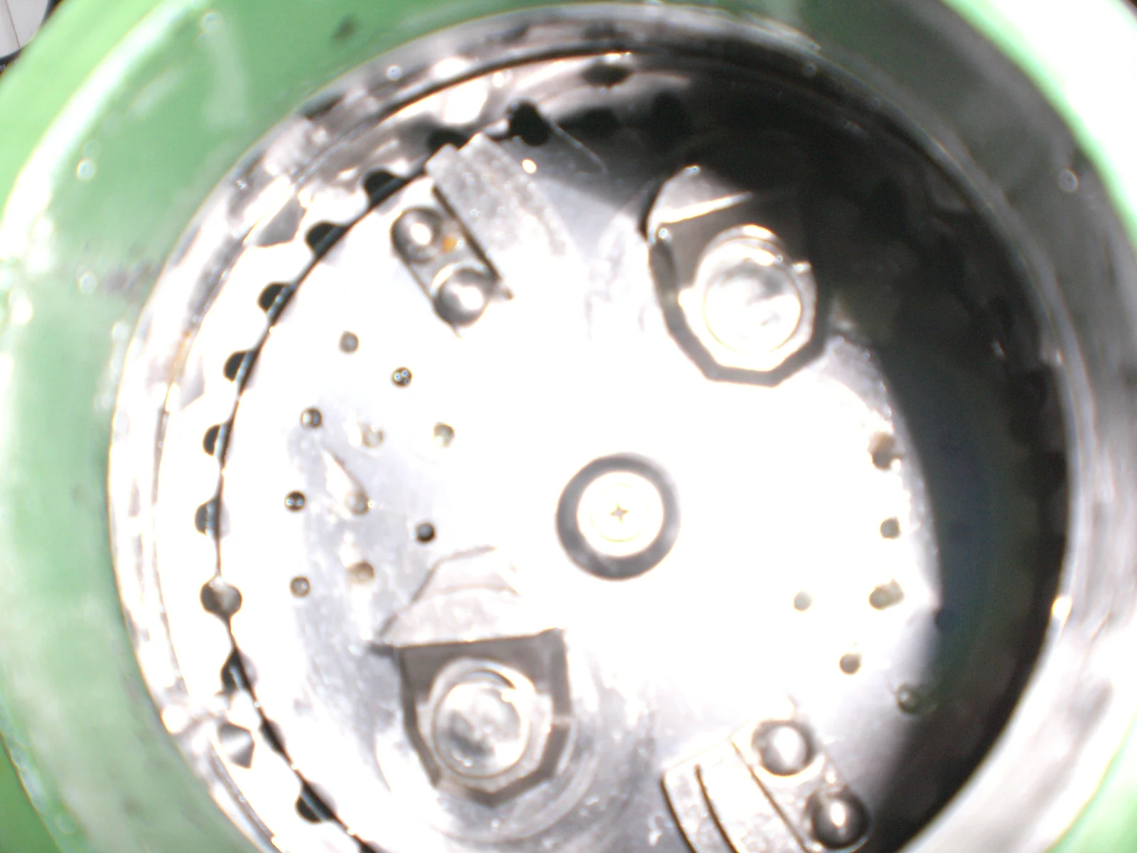 Disposal grinding chamber viewed through the sink opening